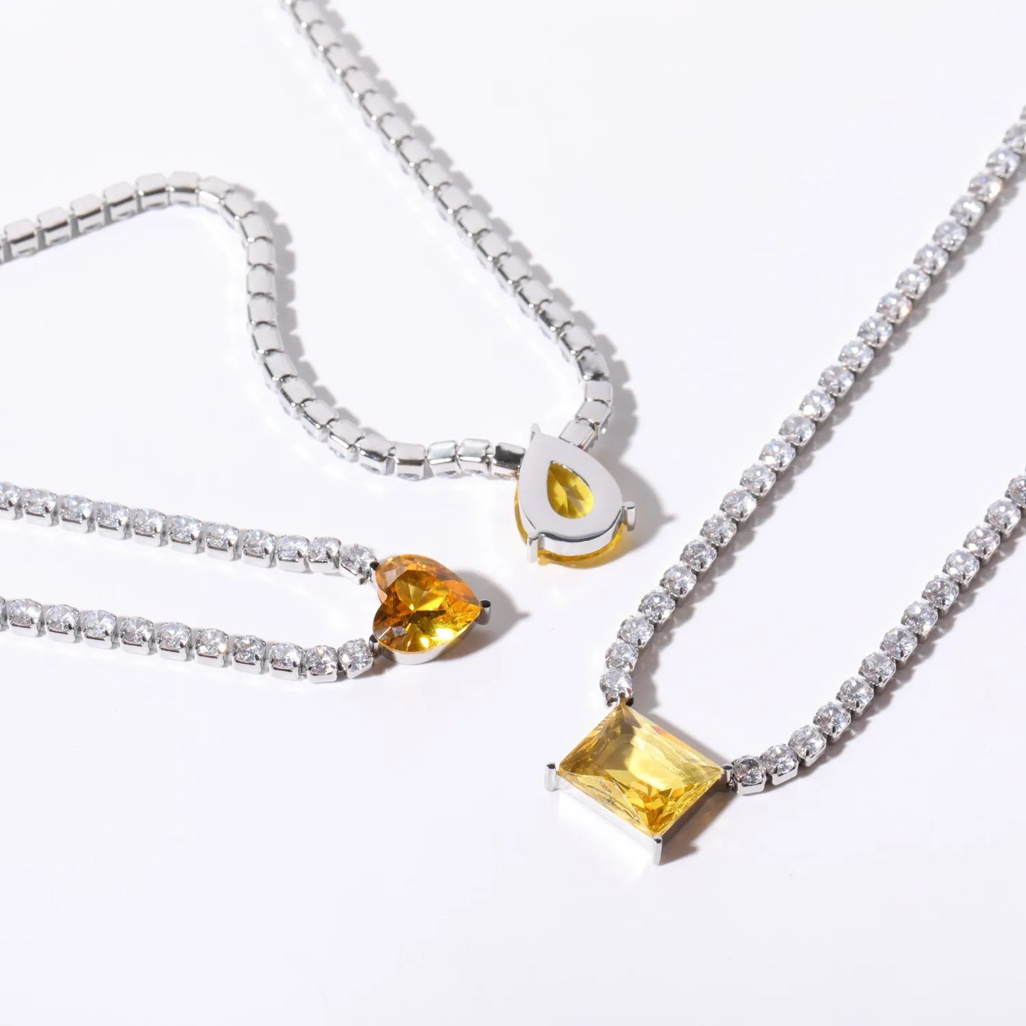 Dreamline - Zircon tennis necklace with heart & drop pendants